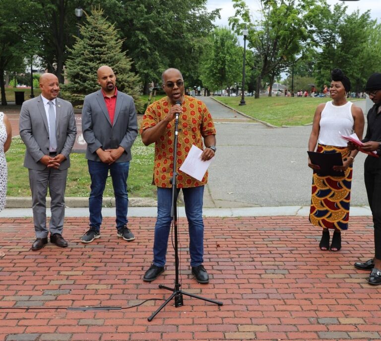 Singer - Kevin Gillespie, left to right - Lawrence Mayor Brian de Pena, Senator Pavel Payano, Lisa Miller-Gillespie, Michael Bastien